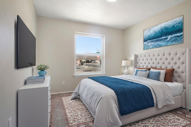 bedroom with light carpet