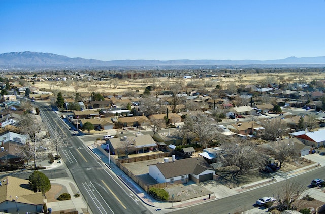 drone / aerial view featuring a mountain view