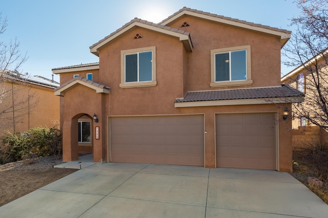 view of front of home with a garage