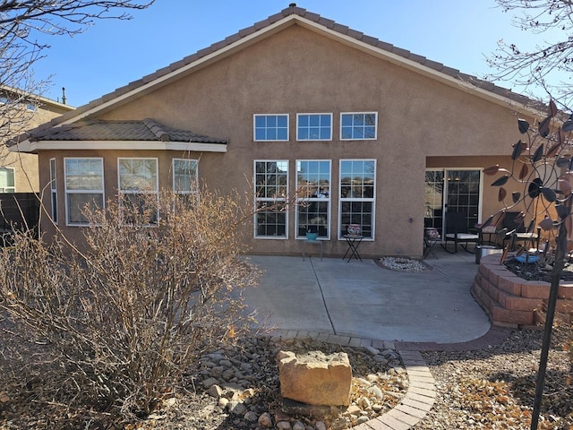 back of house featuring a patio area