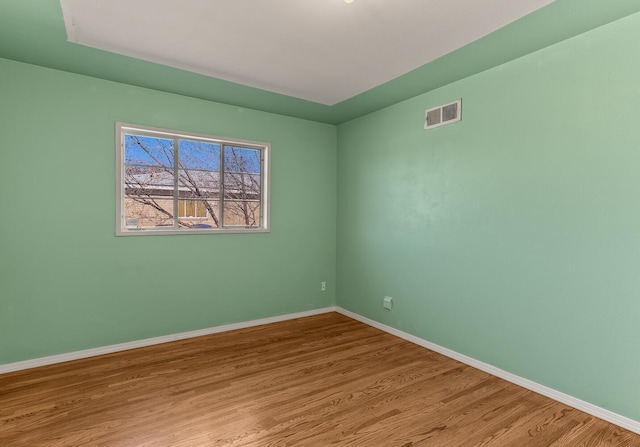 unfurnished room featuring light hardwood / wood-style flooring