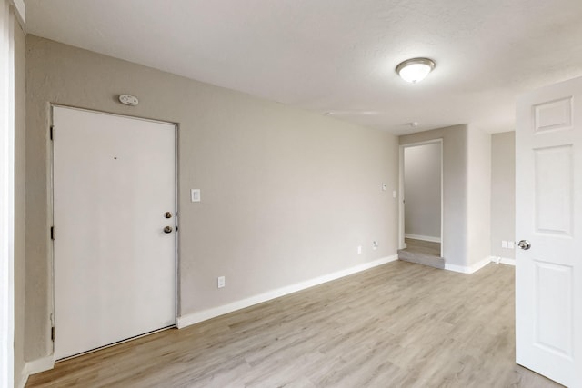 empty room featuring light hardwood / wood-style floors