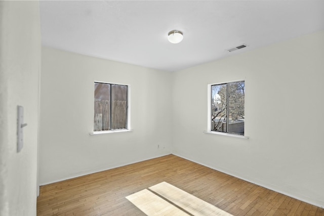 empty room featuring light hardwood / wood-style floors