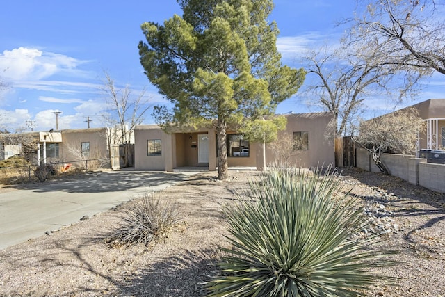 view of adobe home