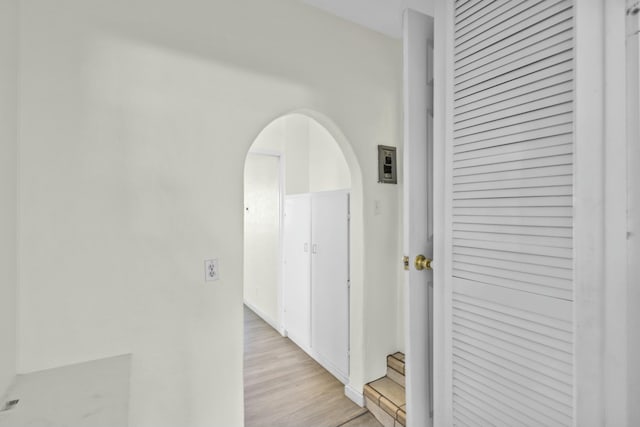 corridor featuring light hardwood / wood-style flooring