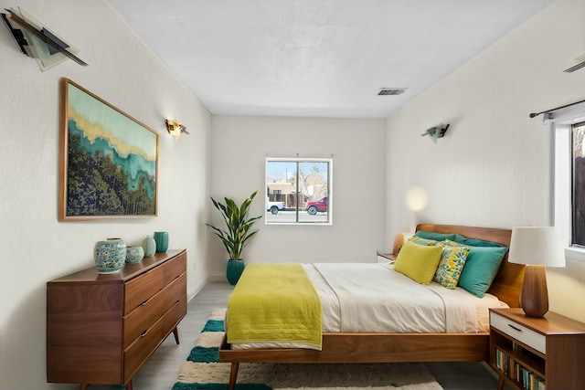 bedroom with light wood-type flooring