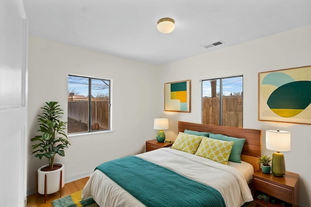 bedroom featuring light hardwood / wood-style floors