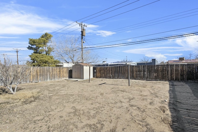 view of yard featuring a storage unit