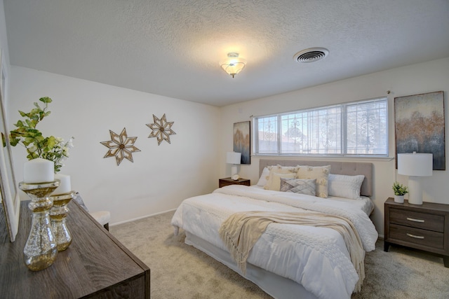 unfurnished bedroom with light colored carpet, electric panel, multiple closets, and a textured ceiling