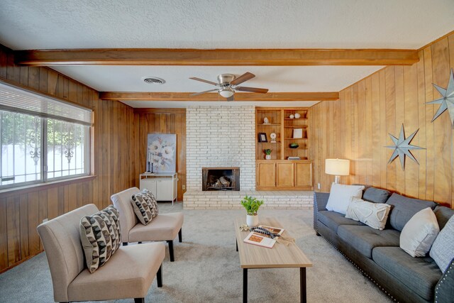 carpeted spare room featuring electric panel and a textured ceiling