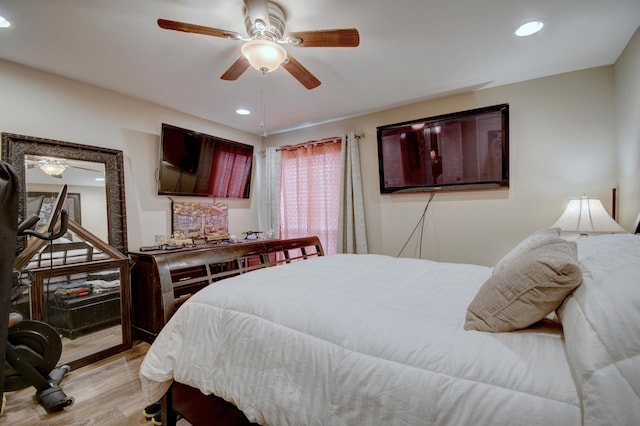 bedroom featuring ceiling fan and light wood-type flooring