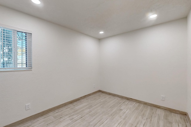 empty room featuring light hardwood / wood-style floors