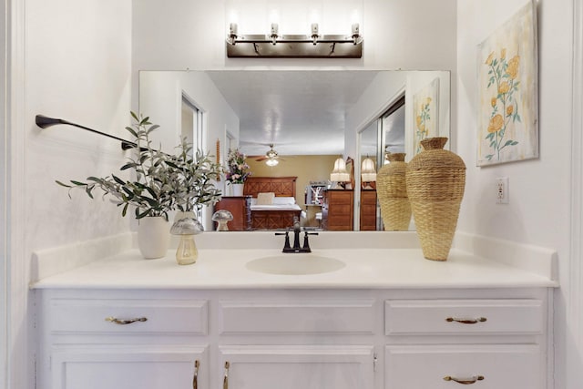 bathroom featuring connected bathroom and vanity