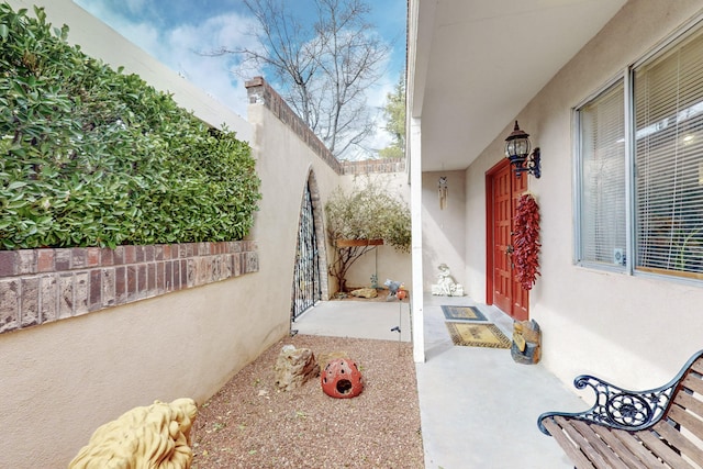 view of patio featuring fence