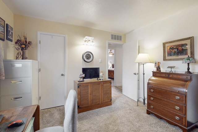 office area with light colored carpet and visible vents