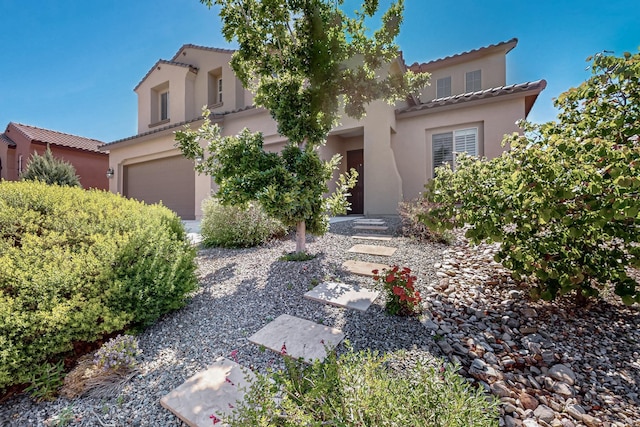 836 Mesa Roja Trl NE, Rio Rancho, NM 87144 - mediterranean / spanish home with a tiled roof, stucco siding, and a garage