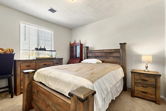836 Mesa Roja Trl NE, Rio Rancho, NM 87144 - bedroom featuring light colored carpet and a textured ceiling