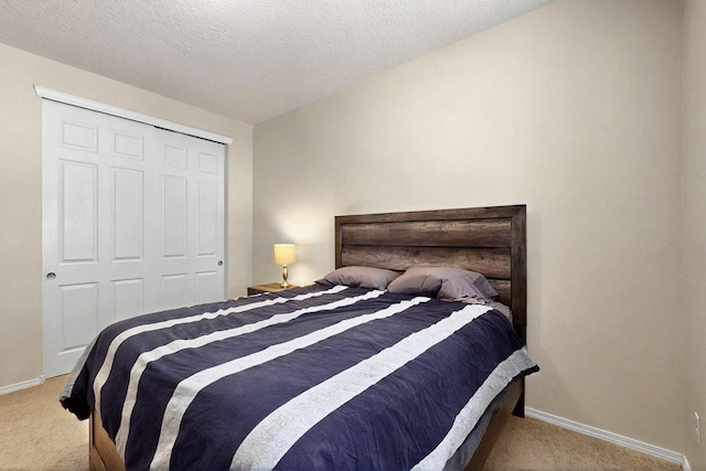 836 Mesa Roja Trl NE, Rio Rancho, NM 87144 - carpeted bedroom with baseboards and a closet