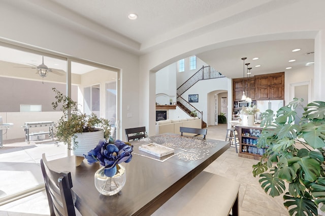 dining space with ceiling fan