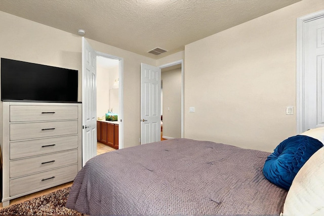 836 Mesa Roja Trl NE, Rio Rancho, NM 87144 - bedroom with connected bathroom