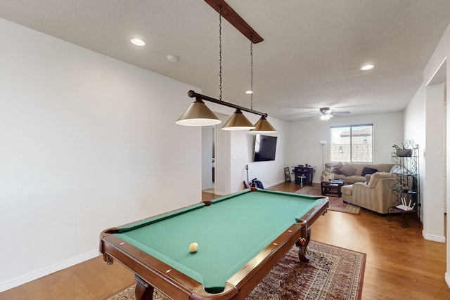 game room featuring hardwood / wood-style floors, pool table, and ceiling fan