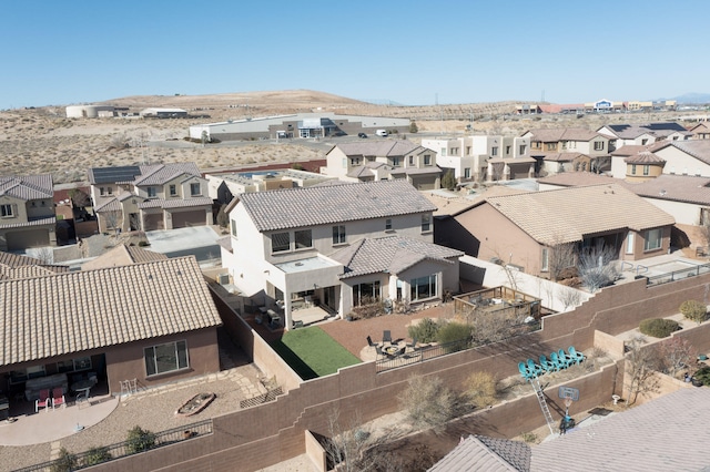 birds eye view of property featuring a mountain view