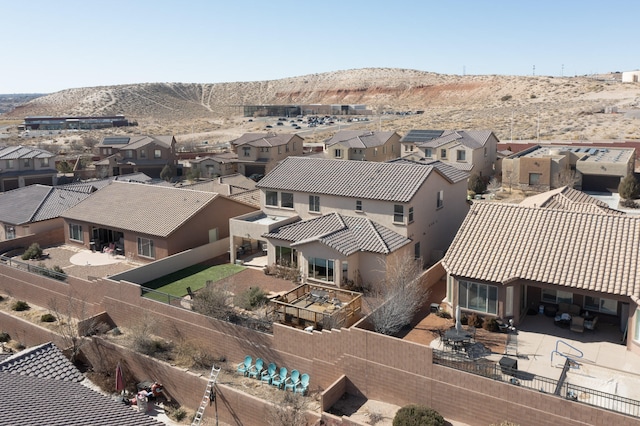 drone / aerial view featuring a mountain view