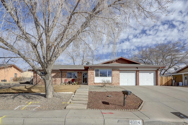 ranch-style home with a garage