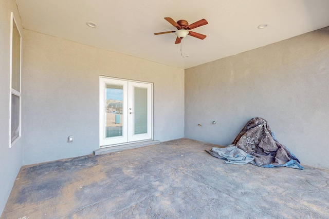 view of patio / terrace with french doors and ceiling fan