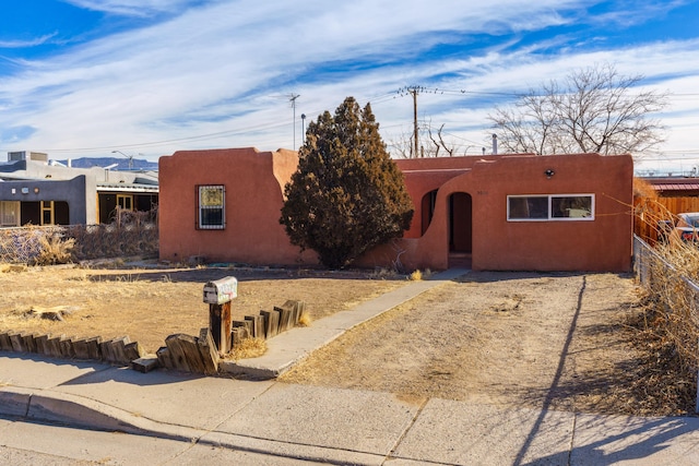 view of adobe home