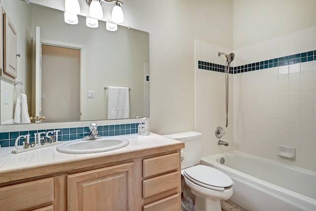 full bathroom with vanity, tasteful backsplash, shower / bathtub combination, and toilet