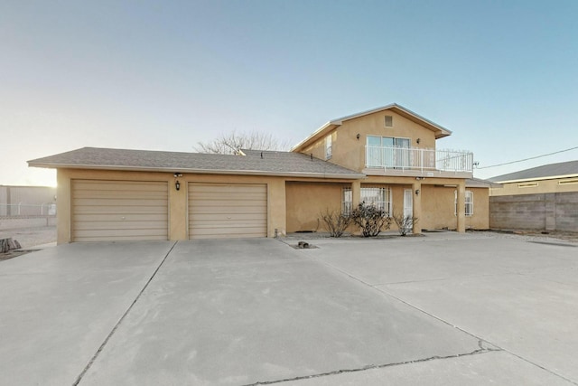 view of front of home with a balcony