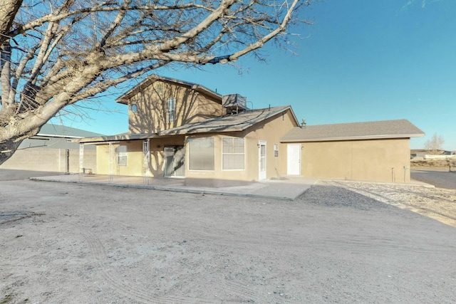 view of front of property with a patio