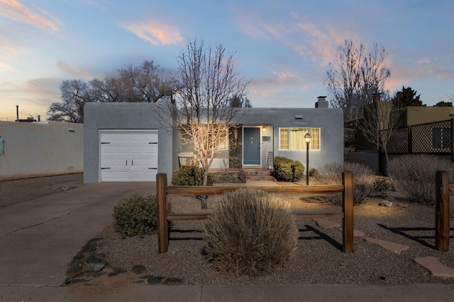 view of front of home featuring a garage