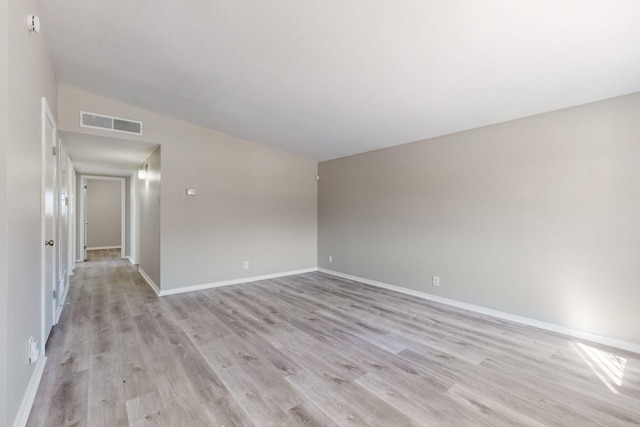 unfurnished room featuring light hardwood / wood-style flooring