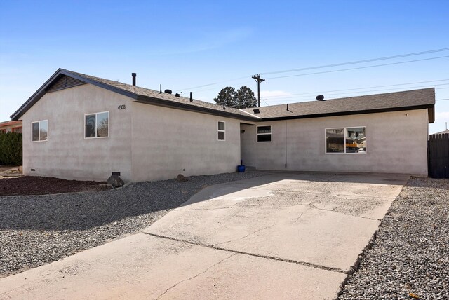 back of property with a patio area