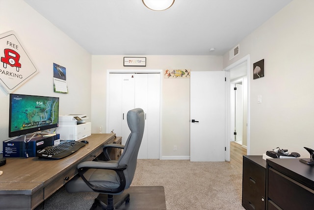 office with light colored carpet and visible vents