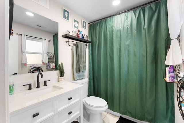 bathroom featuring recessed lighting, visible vents, vanity, and toilet