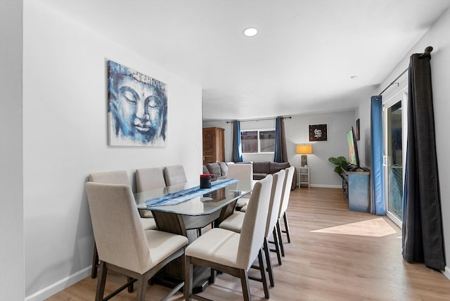 dining room featuring light hardwood / wood-style flooring