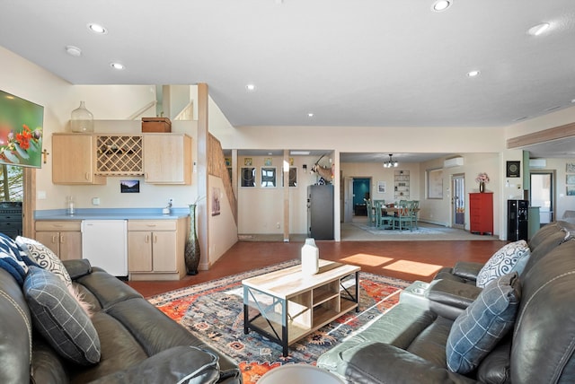 living room featuring bar area and light hardwood / wood-style floors