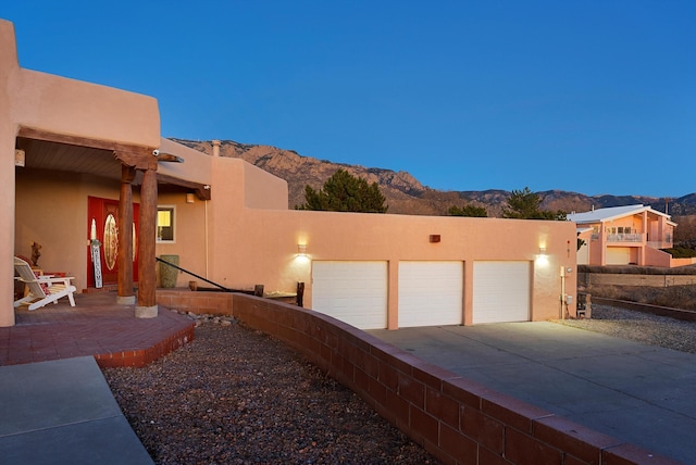 exterior space featuring a mountain view