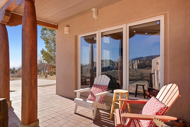 view of patio / terrace with a mountain view