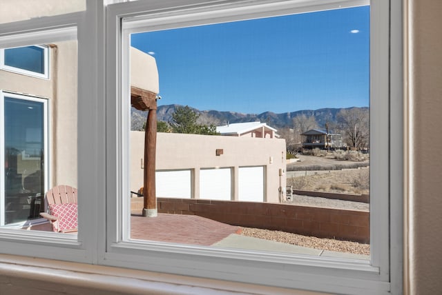 doorway to outside featuring a mountain view