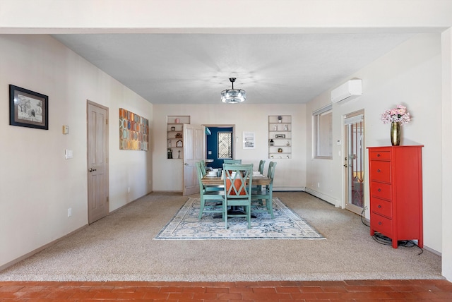 carpeted dining space featuring a wall mounted AC