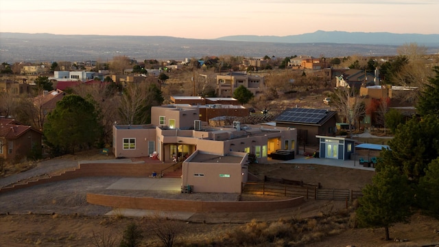 aerial view at dusk with a mountain view