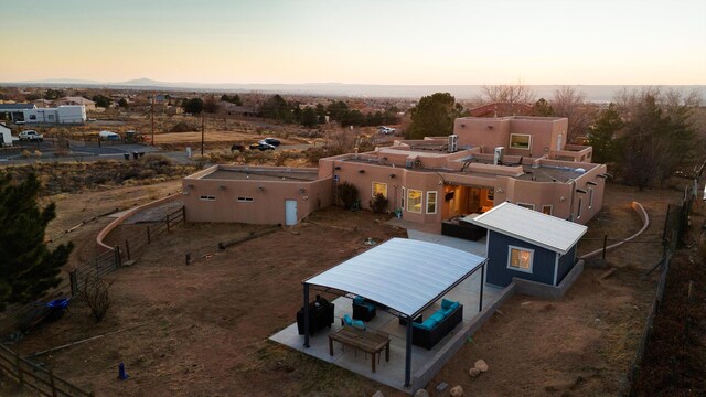 view of aerial view at dusk