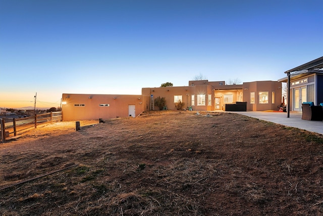 view of front of house with a patio