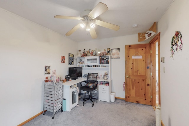 home office featuring ceiling fan and light colored carpet