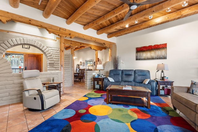 tiled living room featuring beam ceiling and wood ceiling