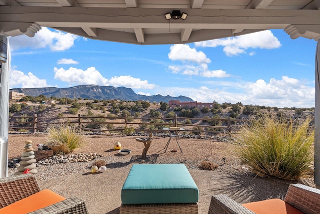 view of patio / terrace with a mountain view